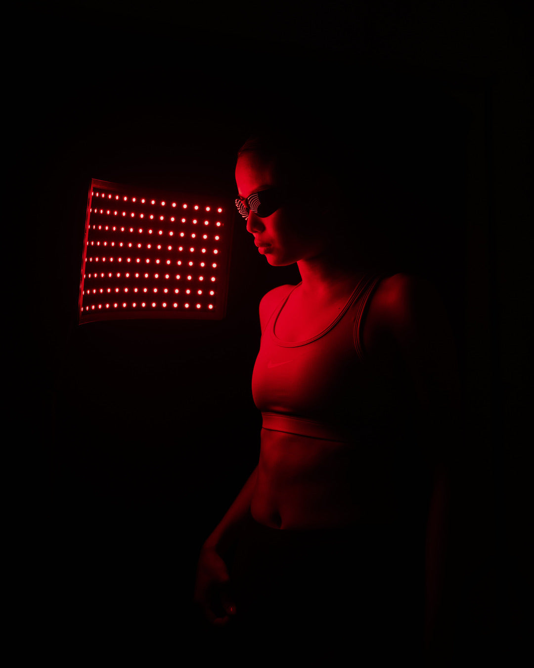 Sesión de fotobiomodulación con luz roja e infrarroja para recuperación muscular